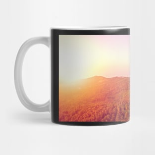 Aerial view of sunset over mountain jungle Mug